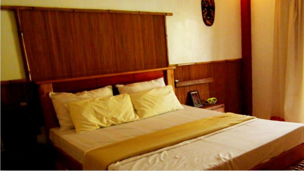 Cooper'S Beach Resort Lucbuan Rum bild